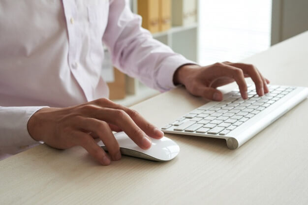 Cropped Anonymous Man Computing White Keyboard Using White Mouse 1098 18917